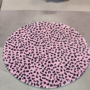 Pink leopard print rug